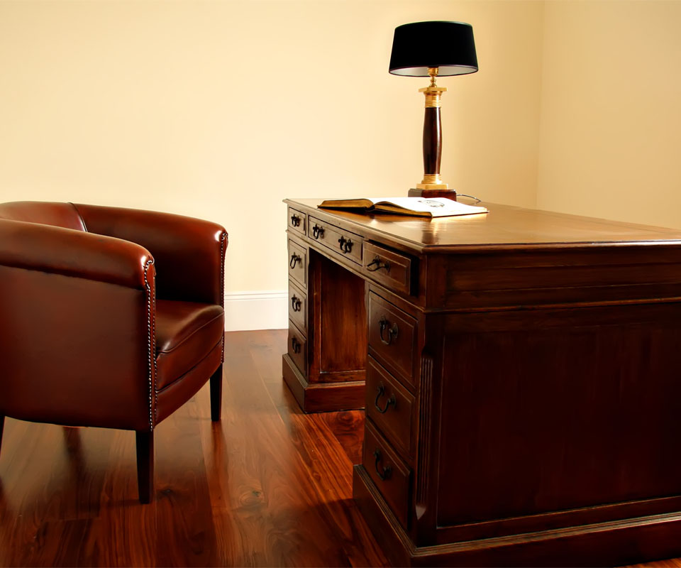 Image showing a wooden desk and leather chair in an office