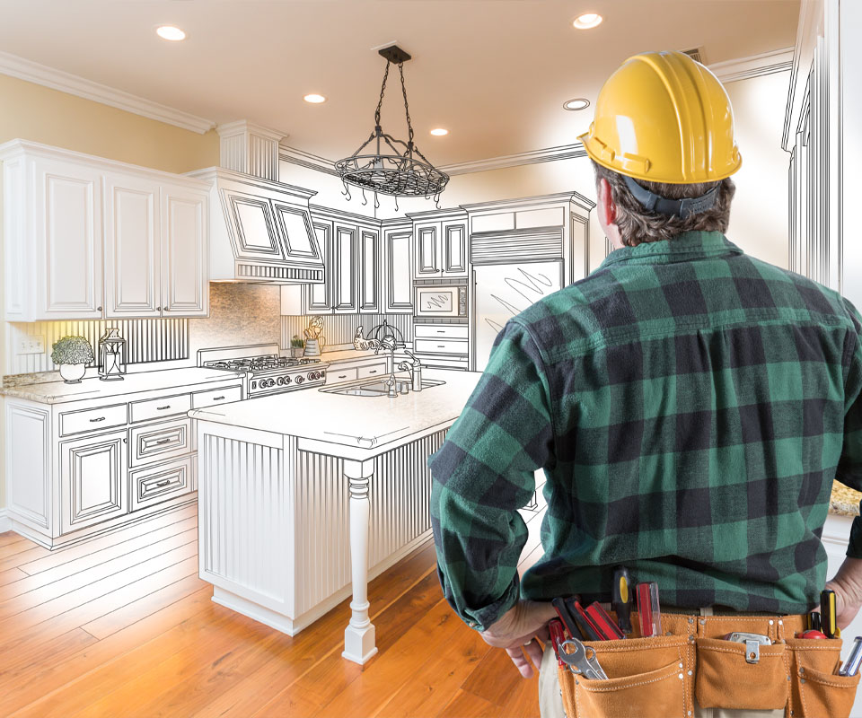 Image showing a contractor in a kitchen with the plans for a new kitchen drawn in 3D