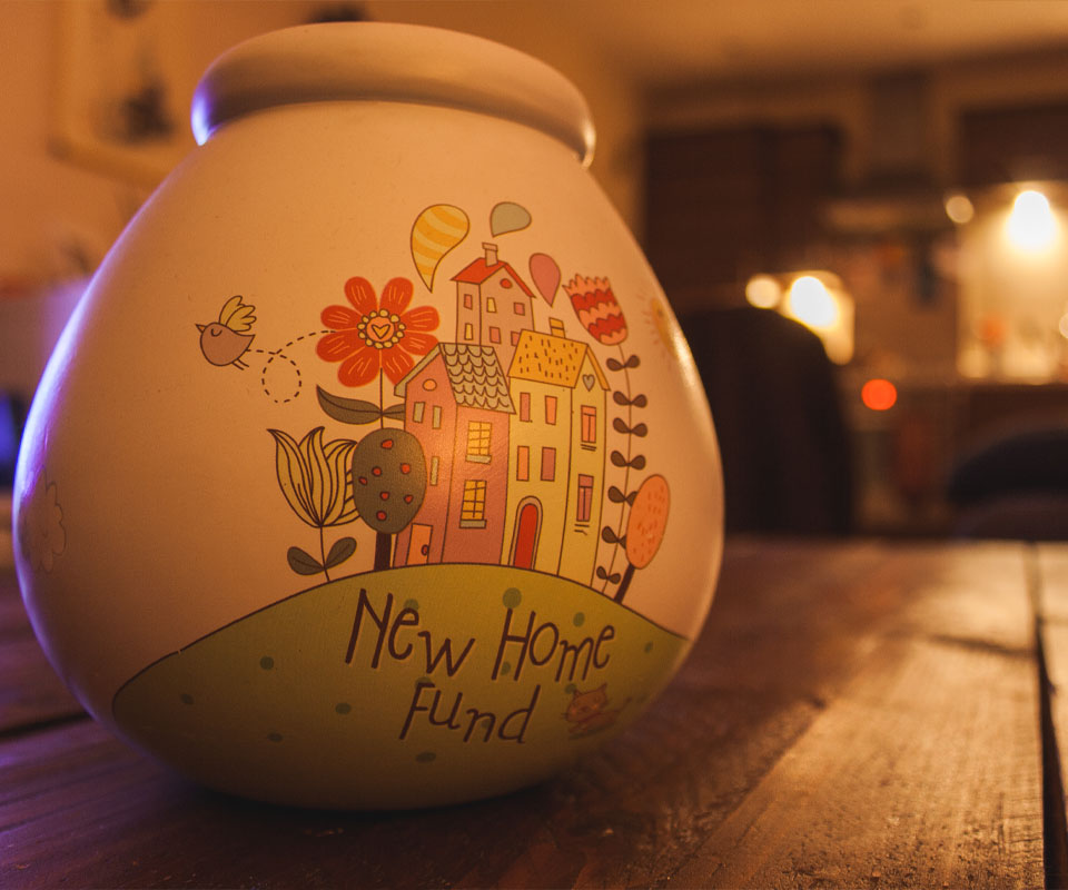 Image showing a money pot with the words "New Home Fund" written on it