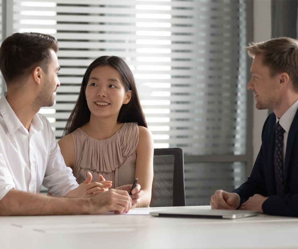 Image showing a young couple in a meeting with a financial adviser