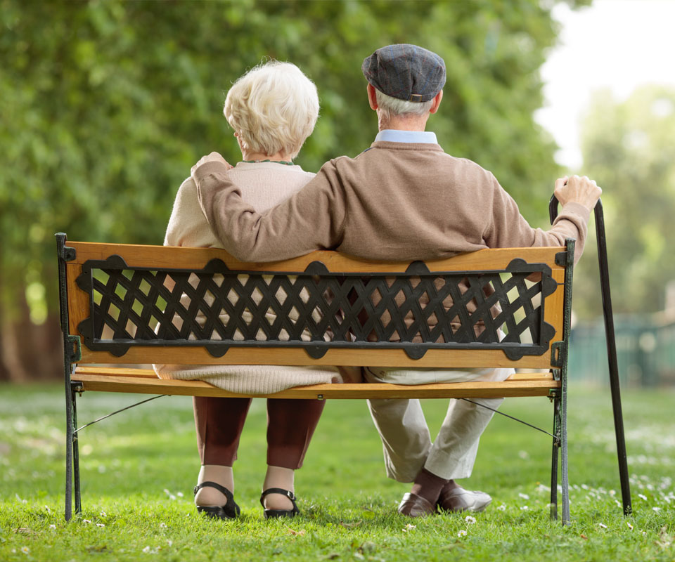 Image showing an elderly couple sitting on a park bench