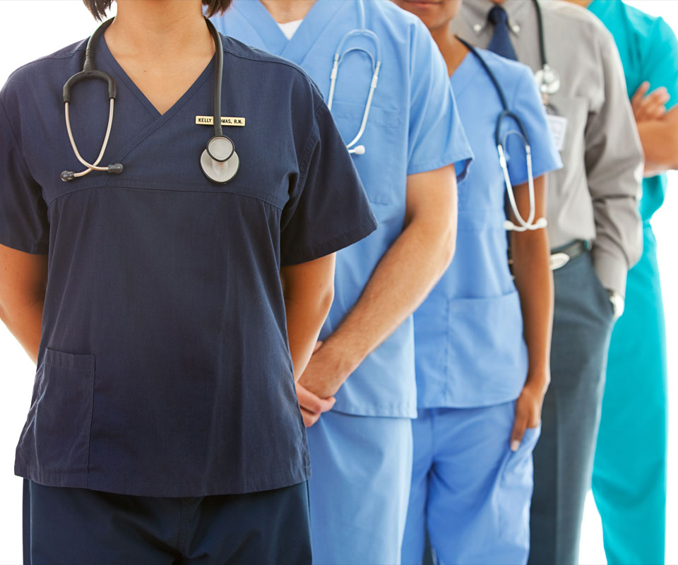 Image showing a close up of a line of medical professionals