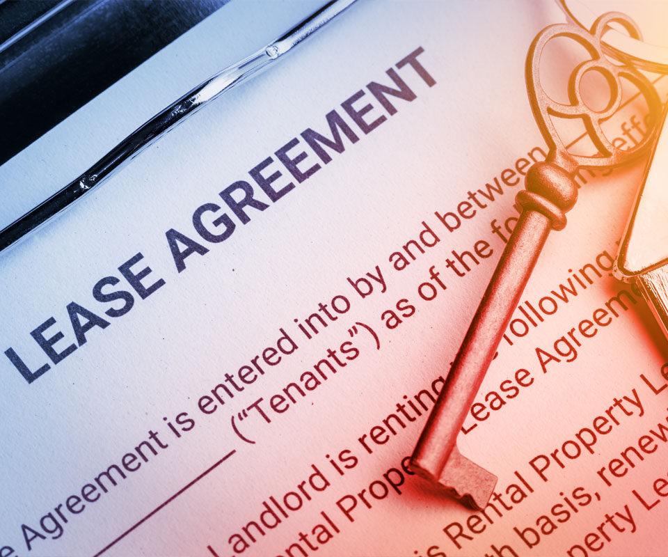 Image showing a close up of a lease agreement with a key on top