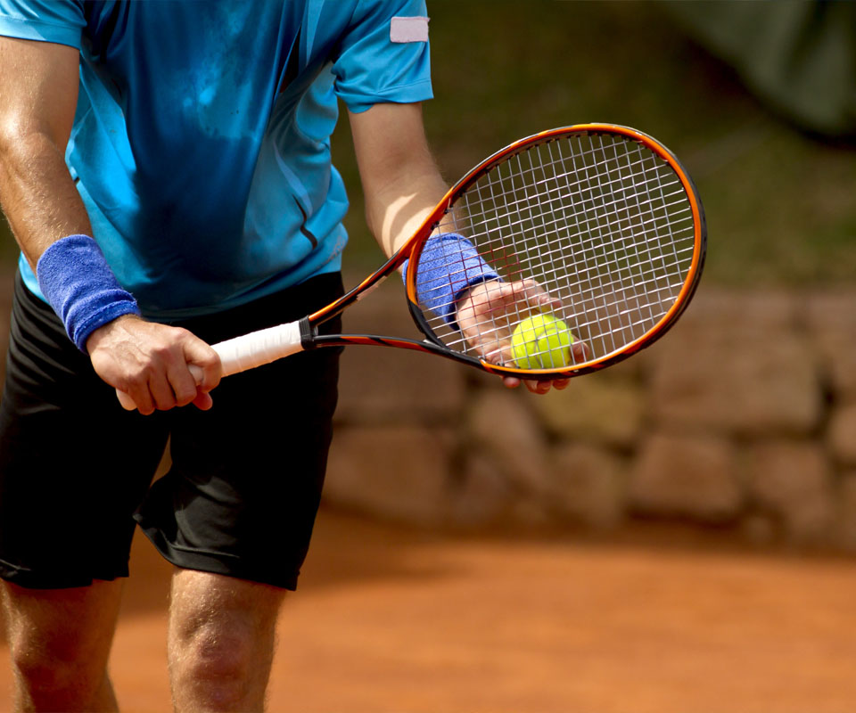 Image showing a close up of a tennis player about to serve