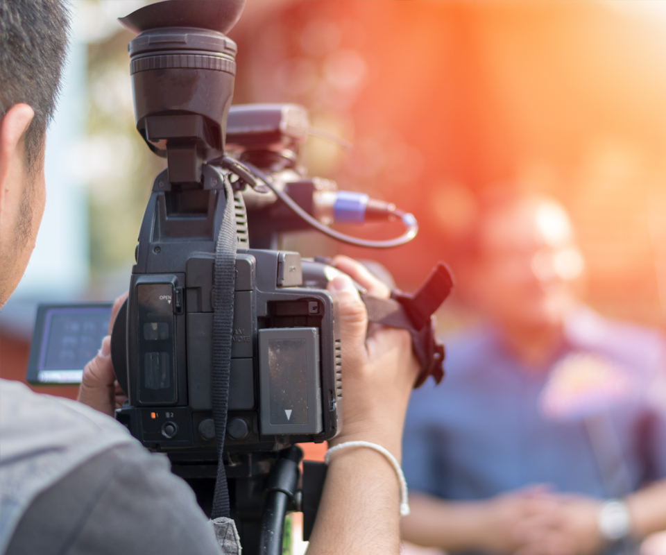 Image showing cameraman working on professional camera